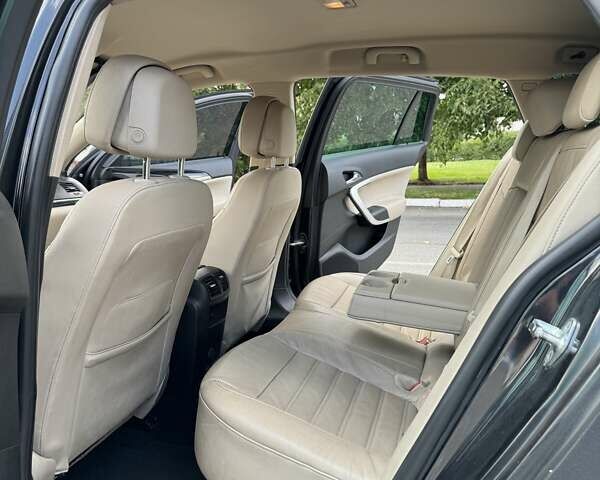 Чорний Опель Інсігнія, об'ємом двигуна 1.96 л та пробігом 237 тис. км за 12000 $, фото 8 на Automoto.ua