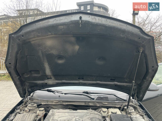 Черный Опель Инсигния, объемом двигателя 2 л и пробегом 180 тыс. км за 9400 $, фото 135 на Automoto.ua