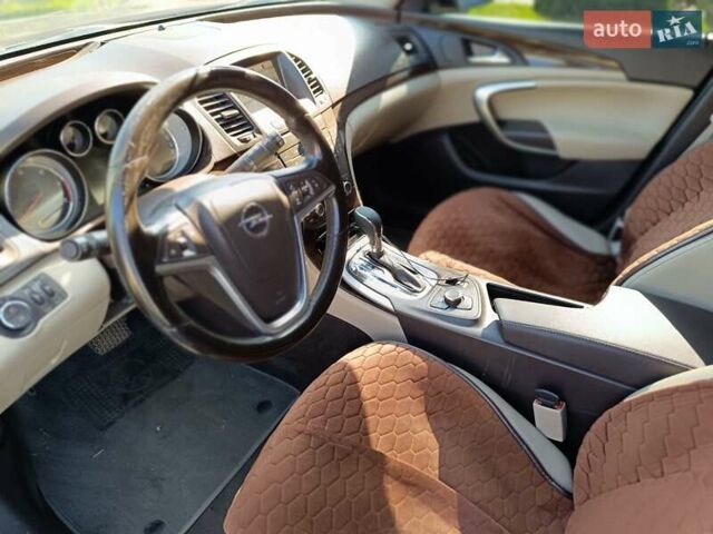 Чорний Опель Інсігнія, об'ємом двигуна 1.96 л та пробігом 295 тис. км за 7800 $, фото 7 на Automoto.ua