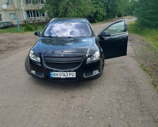 Чорний Опель Інсігнія, об'ємом двигуна 2 л та пробігом 194 тис. км за 12100 $, фото 14 на Automoto.ua