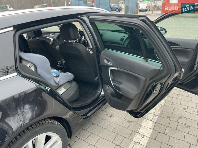 Черный Опель Инсигния, объемом двигателя 2 л и пробегом 180 тыс. км за 9400 $, фото 74 на Automoto.ua