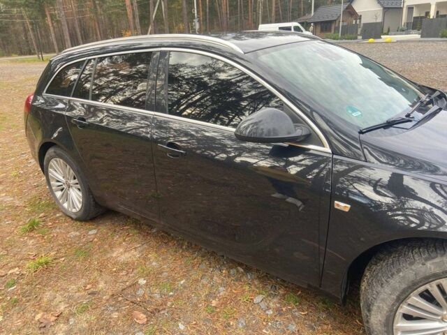 Черный Опель Инсигния, объемом двигателя 2 л и пробегом 270 тыс. км за 8800 $, фото 3 на Automoto.ua