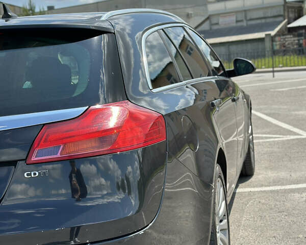 Черный Опель Инсигния, объемом двигателя 1.96 л и пробегом 290 тыс. км за 7999 $, фото 1 на Automoto.ua