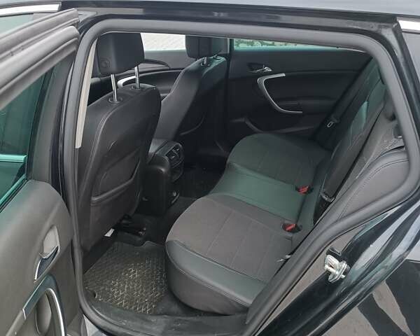 Чорний Опель Інсігнія, об'ємом двигуна 1.96 л та пробігом 300 тис. км за 7700 $, фото 5 на Automoto.ua