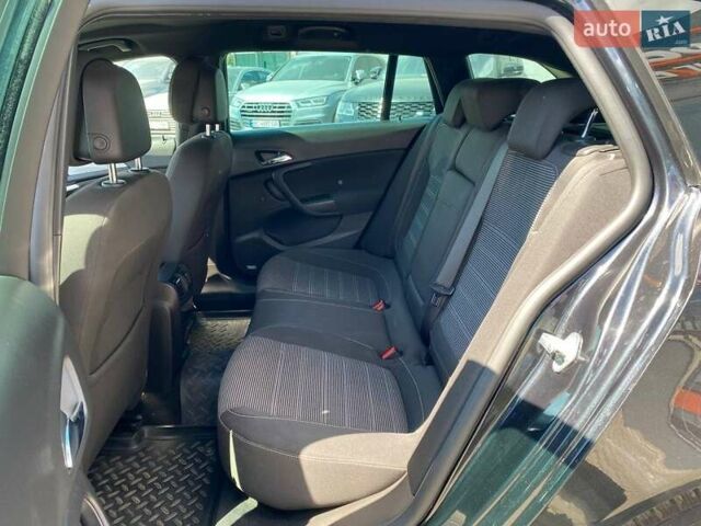 Черный Опель Инсигния, объемом двигателя 1.96 л и пробегом 211 тыс. км за 8500 $, фото 20 на Automoto.ua