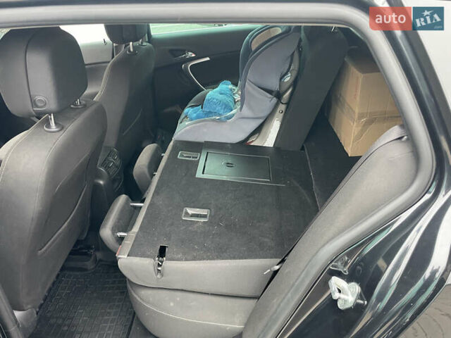 Черный Опель Инсигния, объемом двигателя 2 л и пробегом 180 тыс. км за 9400 $, фото 106 на Automoto.ua