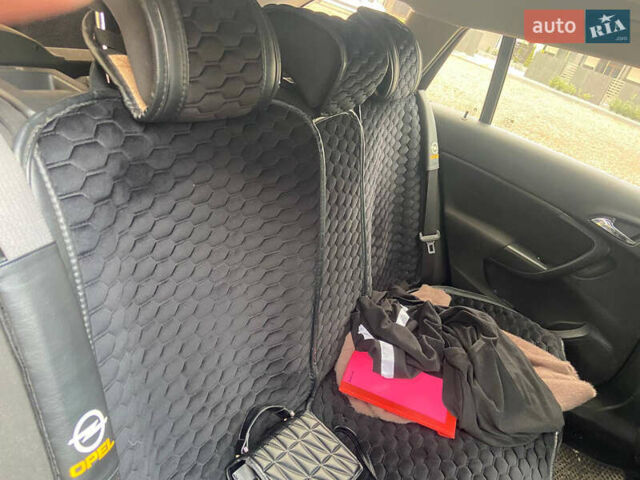 Черный Опель Инсигния, объемом двигателя 2 л и пробегом 270 тыс. км за 8800 $, фото 13 на Automoto.ua