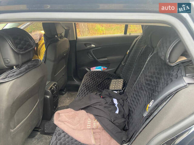 Черный Опель Инсигния, объемом двигателя 2 л и пробегом 270 тыс. км за 8800 $, фото 12 на Automoto.ua