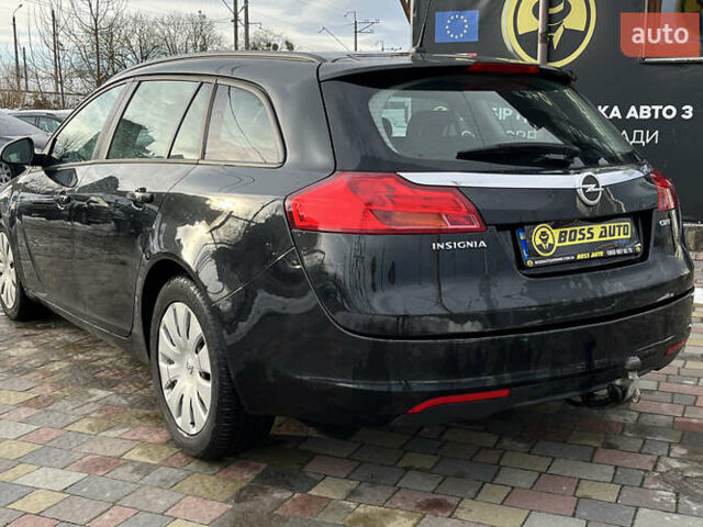 Чорний Опель Інсігнія, об'ємом двигуна 1.96 л та пробігом 244 тис. км за 8100 $, фото 4 на Automoto.ua