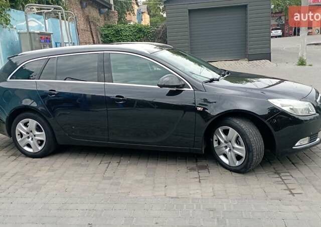 Чорний Опель Інсігнія, об'ємом двигуна 1.96 л та пробігом 234 тис. км за 8800 $, фото 12 на Automoto.ua