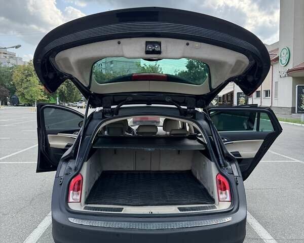 Чорний Опель Інсігнія, об'ємом двигуна 1.96 л та пробігом 237 тис. км за 12000 $, фото 14 на Automoto.ua