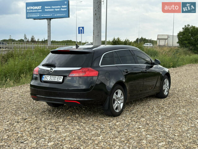 Чорний Опель Інсігнія, об'ємом двигуна 1.96 л та пробігом 275 тис. км за 7300 $, фото 4 на Automoto.ua
