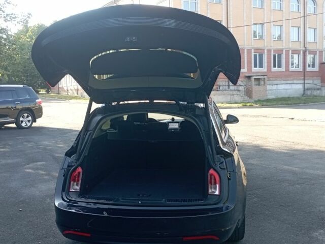 Чорний Опель Інсігнія, об'ємом двигуна 2 л та пробігом 236 тис. км за 8800 $, фото 6 на Automoto.ua