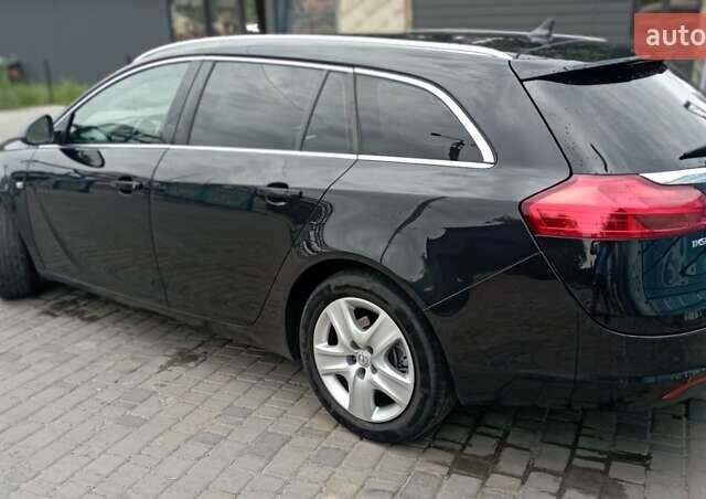 Чорний Опель Інсігнія, об'ємом двигуна 1.96 л та пробігом 234 тис. км за 8800 $, фото 5 на Automoto.ua