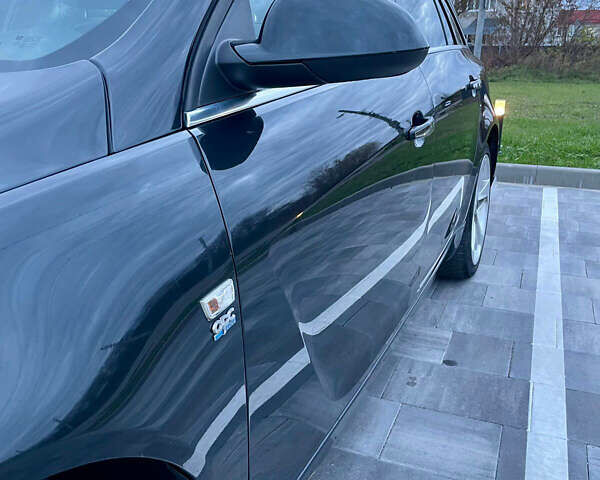 Черный Опель Инсигния, объемом двигателя 2 л и пробегом 243 тыс. км за 12500 $, фото 5 на Automoto.ua