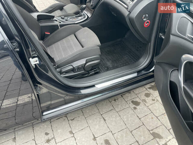 Черный Опель Инсигния, объемом двигателя 2 л и пробегом 180 тыс. км за 9400 $, фото 64 на Automoto.ua