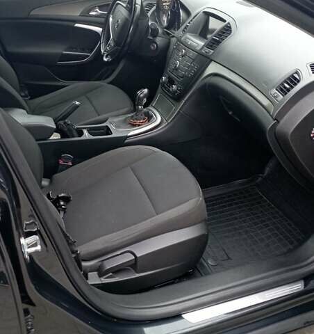 Чорний Опель Інсігнія, об'ємом двигуна 1.96 л та пробігом 234 тис. км за 8800 $, фото 23 на Automoto.ua