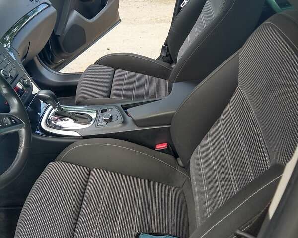 Чорний Опель Інсігнія, об'ємом двигуна 2 л та пробігом 194 тис. км за 12100 $, фото 7 на Automoto.ua