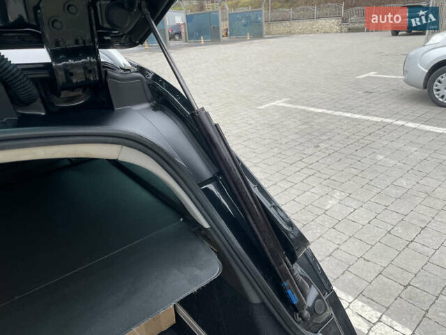 Черный Опель Инсигния, объемом двигателя 2 л и пробегом 180 тыс. км за 9400 $, фото 92 на Automoto.ua