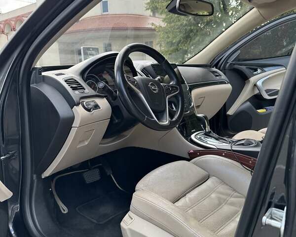 Чорний Опель Інсігнія, об'ємом двигуна 1.96 л та пробігом 237 тис. км за 12000 $, фото 11 на Automoto.ua