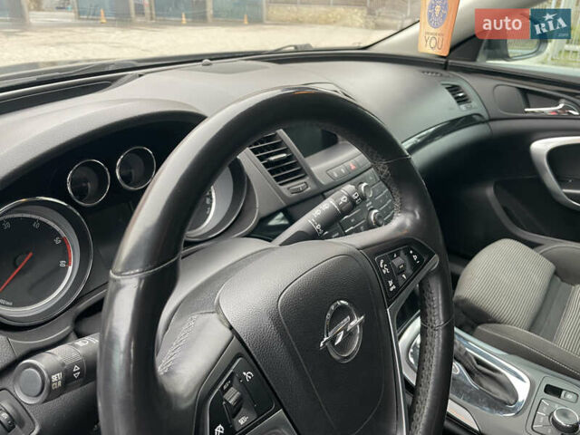 Черный Опель Инсигния, объемом двигателя 2 л и пробегом 180 тыс. км за 9400 $, фото 116 на Automoto.ua