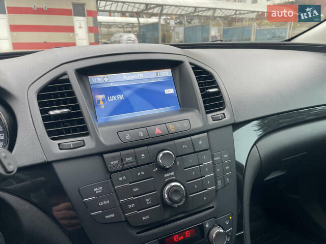 Черный Опель Инсигния, объемом двигателя 2 л и пробегом 180 тыс. км за 9400 $, фото 123 на Automoto.ua