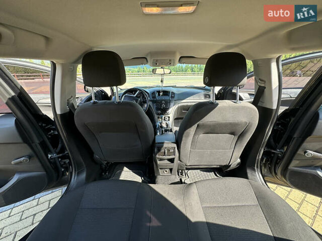 Черный Опель Инсигния, объемом двигателя 2 л и пробегом 299 тыс. км за 7799 $, фото 6 на Automoto.ua