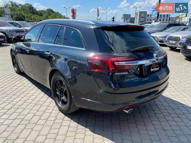 Черный Опель Инсигния, объемом двигателя 1.96 л и пробегом 211 тыс. км за 8300 $, фото 4 на Automoto.ua