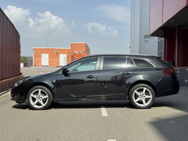 Черный Опель Инсигния, объемом двигателя 2 л и пробегом 253 тыс. км за 8950 $, фото 6 на Automoto.ua