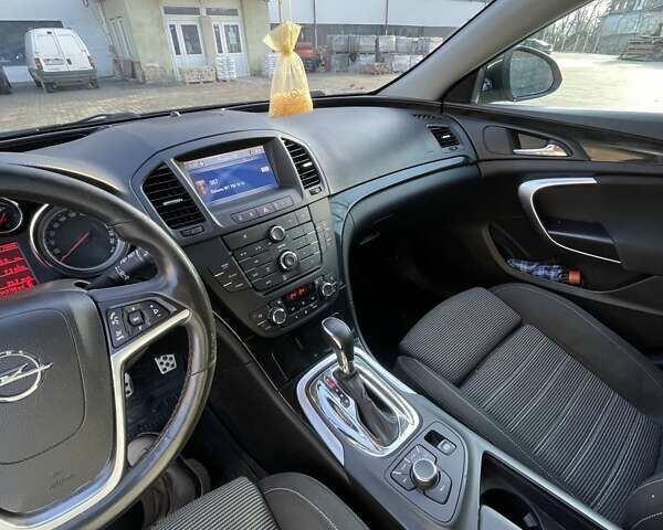 Черный Опель Инсигния, объемом двигателя 1.96 л и пробегом 340 тыс. км за 7500 $, фото 7 на Automoto.ua