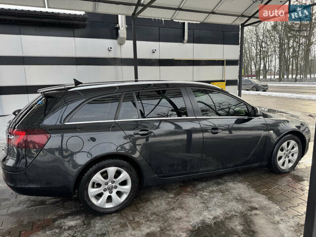 Чорний Опель Інсігнія, об'ємом двигуна 1.96 л та пробігом 236 тис. км за 10999 $, фото 9 на Automoto.ua