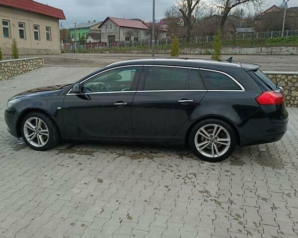 Чорний Опель Інсігнія, об'ємом двигуна 1.96 л та пробігом 300 тис. км за 7700 $, фото 1 на Automoto.ua
