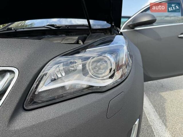 Чорний Опель Інсігнія, об'ємом двигуна 1.96 л та пробігом 237 тис. км за 12000 $, фото 22 на Automoto.ua