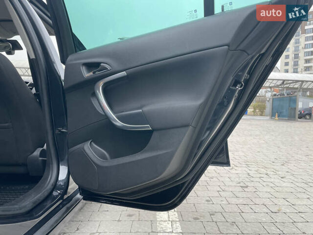 Черный Опель Инсигния, объемом двигателя 2 л и пробегом 180 тыс. км за 9400 $, фото 76 на Automoto.ua