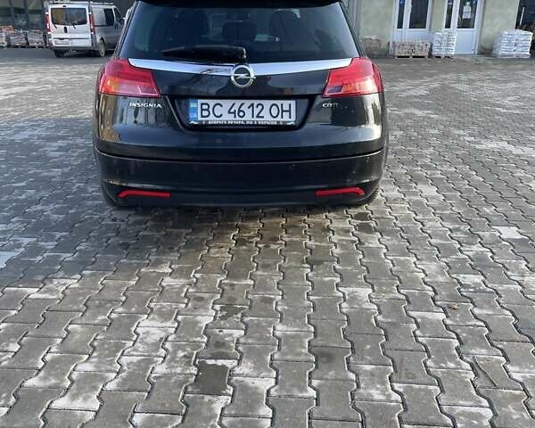 Черный Опель Инсигния, объемом двигателя 1.96 л и пробегом 340 тыс. км за 7500 $, фото 5 на Automoto.ua