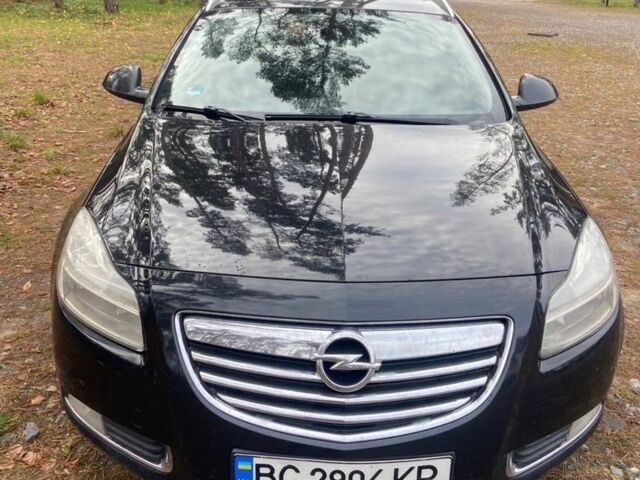 Черный Опель Инсигния, объемом двигателя 2 л и пробегом 270 тыс. км за 8800 $, фото 4 на Automoto.ua