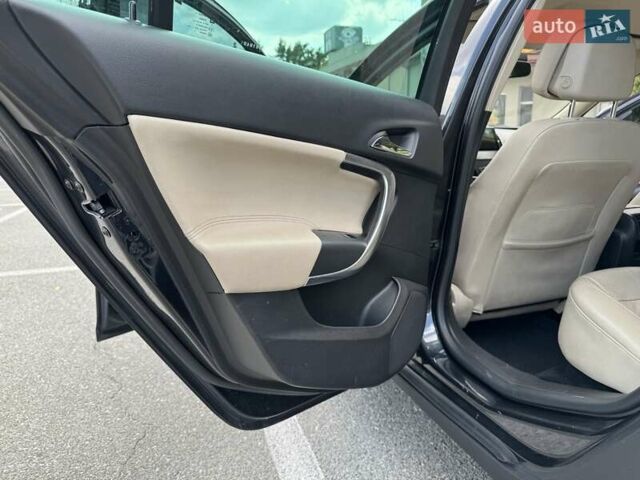 Чорний Опель Інсігнія, об'ємом двигуна 1.96 л та пробігом 237 тис. км за 12000 $, фото 9 на Automoto.ua