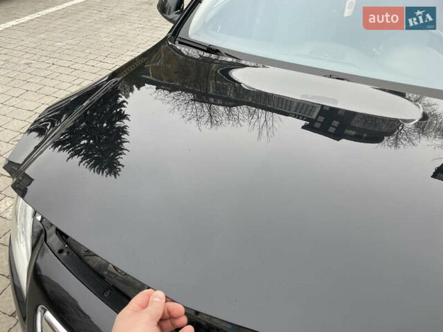 Черный Опель Инсигния, объемом двигателя 2 л и пробегом 180 тыс. км за 9400 $, фото 128 на Automoto.ua