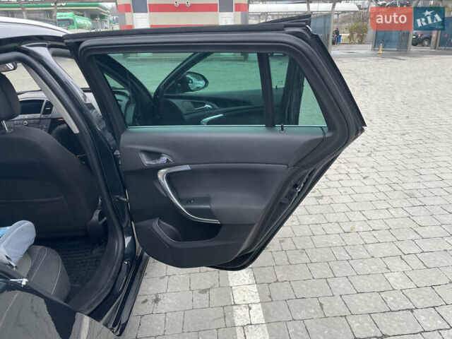 Черный Опель Инсигния, объемом двигателя 2 л и пробегом 180 тыс. км за 9400 $, фото 75 на Automoto.ua