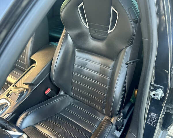 Черный Опель Инсигния, объемом двигателя 2 л и пробегом 250 тыс. км за 9800 $, фото 5 на Automoto.ua