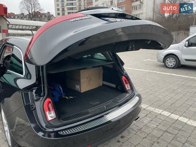 Черный Опель Инсигния, объемом двигателя 2 л и пробегом 180 тыс. км за 9400 $, фото 95 на Automoto.ua