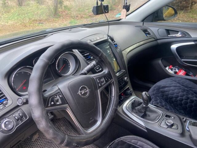 Черный Опель Инсигния, объемом двигателя 2 л и пробегом 270 тыс. км за 8800 $, фото 6 на Automoto.ua