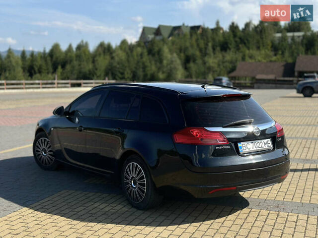 Черный Опель Инсигния, объемом двигателя 2 л и пробегом 299 тыс. км за 7799 $, фото 2 на Automoto.ua