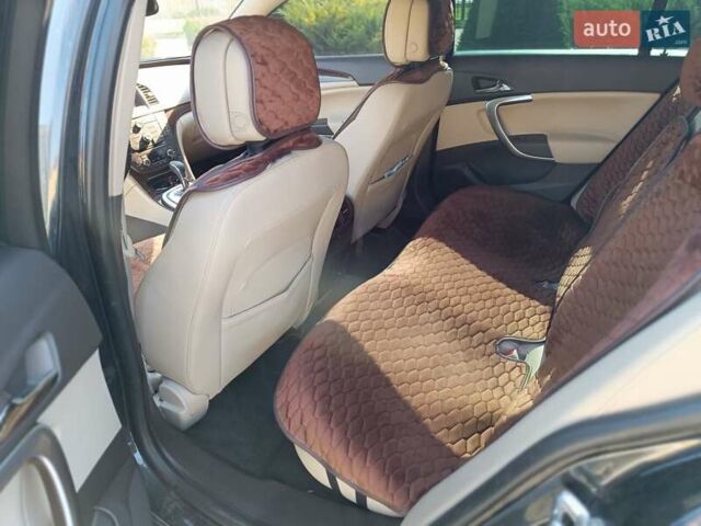 Чорний Опель Інсігнія, об'ємом двигуна 1.96 л та пробігом 295 тис. км за 7800 $, фото 8 на Automoto.ua