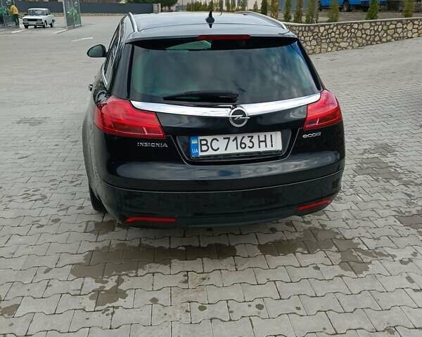 Чорний Опель Інсігнія, об'ємом двигуна 1.96 л та пробігом 300 тис. км за 7700 $, фото 3 на Automoto.ua