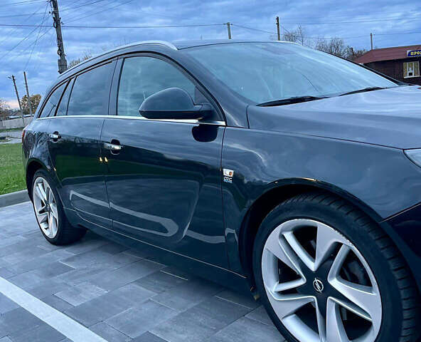 Черный Опель Инсигния, объемом двигателя 2 л и пробегом 243 тыс. км за 12500 $, фото 4 на Automoto.ua