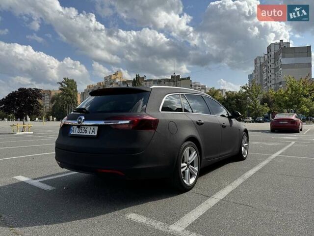 Чорний Опель Інсігнія, об'ємом двигуна 1.96 л та пробігом 237 тис. км за 12000 $, фото 3 на Automoto.ua