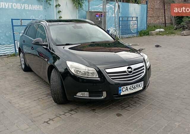 Чорний Опель Інсігнія, об'ємом двигуна 1.96 л та пробігом 234 тис. км за 8800 $, фото 11 на Automoto.ua