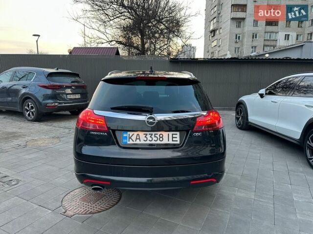 Чорний Опель Інсігнія, об'ємом двигуна 1.96 л та пробігом 251 тис. км за 11300 $, фото 6 на Automoto.ua
