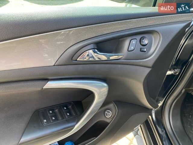 Черный Опель Инсигния, объемом двигателя 1.96 л и пробегом 211 тыс. км за 8300 $, фото 11 на Automoto.ua